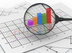 image - Magnifier-at-Graph-Paper-with-Chart-300x221